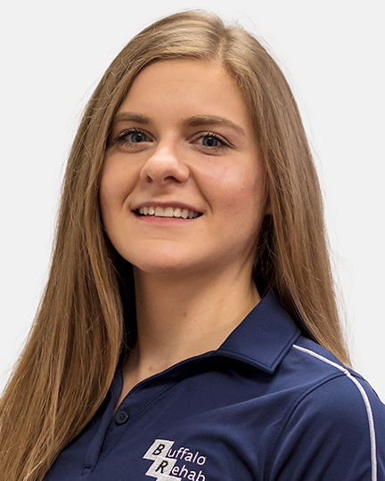 Portrait of a smiling Caucasian woman wearing a blue t-shirt.
