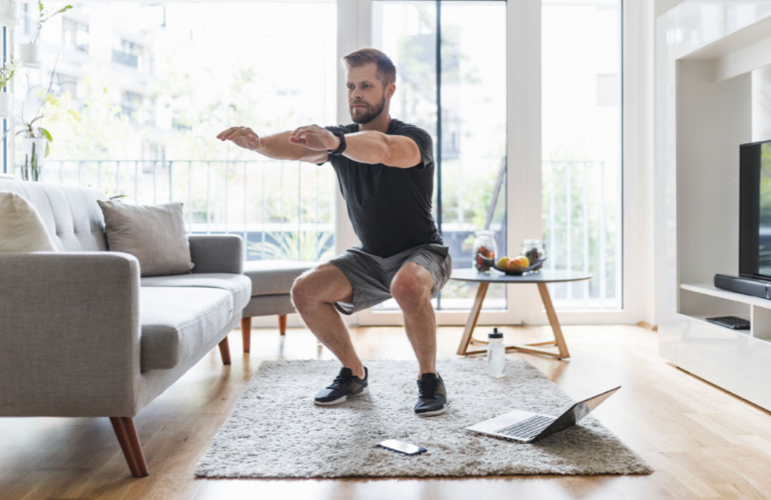 A certified occupational therapy assistant smiles as she converses with her patient.